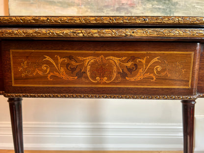 A Napoleon III Style Gilt Bronze Mounted Mahogany and Marquetry Table