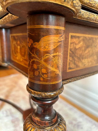 A Napoleon III Style Gilt Bronze Mounted Mahogany and Marquetry Table