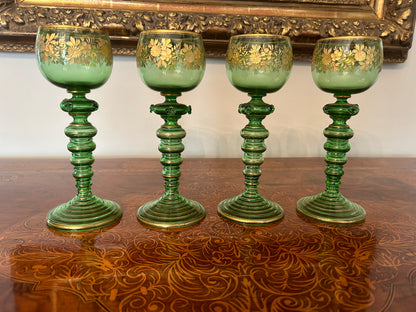 Four Continental Engraved and Gilt Green Glass Roemers, c.1900