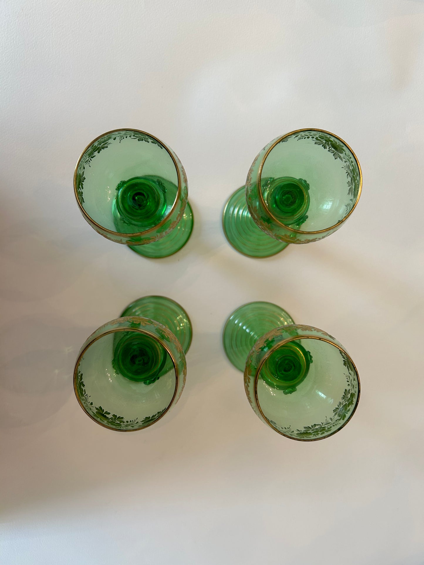 Four Continental Engraved and Gilt Green Glass Roemers, c.1900